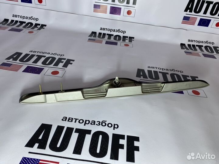 Накладка крышки багажника Toyota Corolla ZZE124