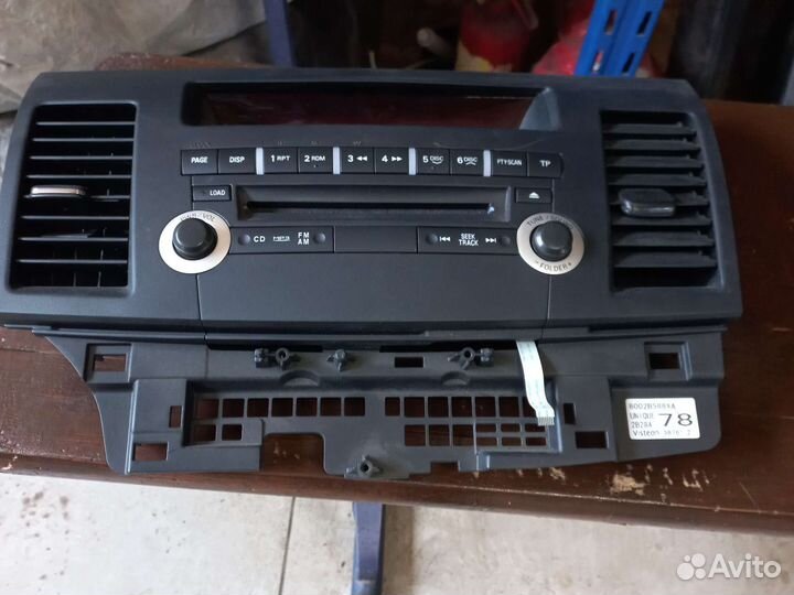 Панель магнитолы Mitsubishi Lancer X