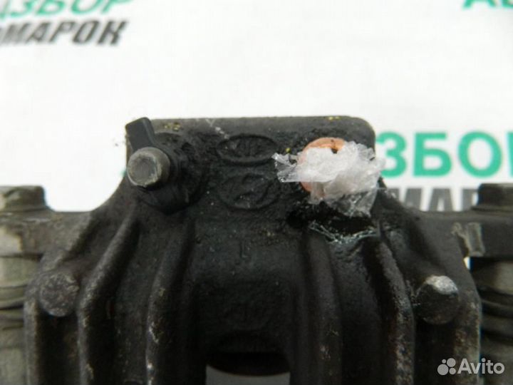 Суппорт задний левый для Hyundai Santa Fe 2 2006