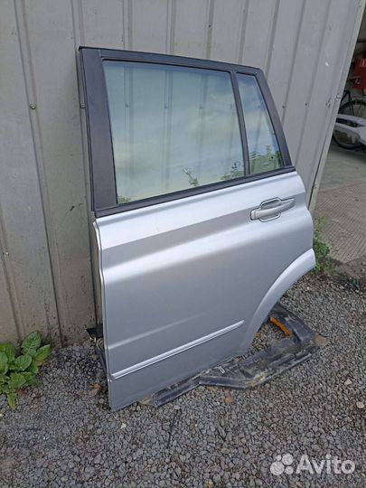 Дверь задняя левая SsangYong Kyron 05-14г