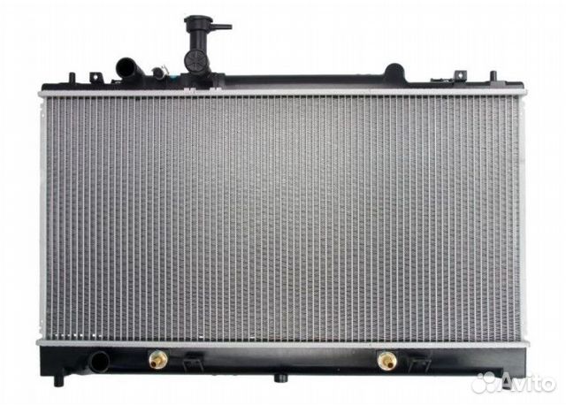 Радиатор охлаждения Мазда Mazda. Новый