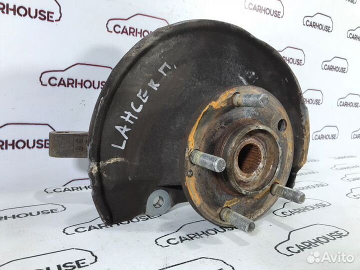 Кулак поворотный передний правый Mitsubishi Lancer