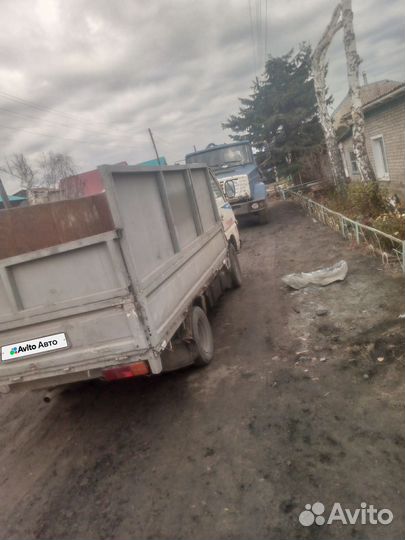 Бортовой грузовик Nissan Atlas, 1986