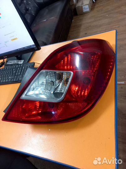 Фонарь правый Opel Corsa D