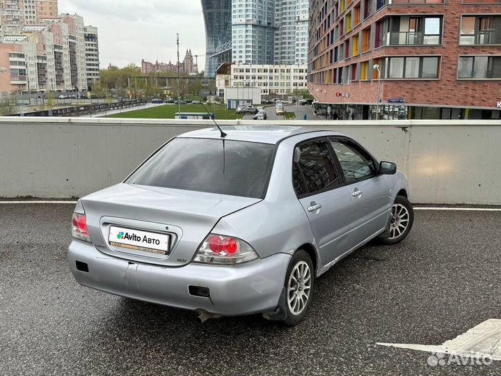 Mitsubishi Lancer 1.6 AT, 2003, 236 500 км