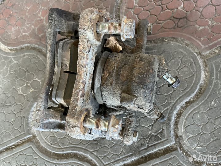 Суппорт тормозной для Nissan Note (E11)