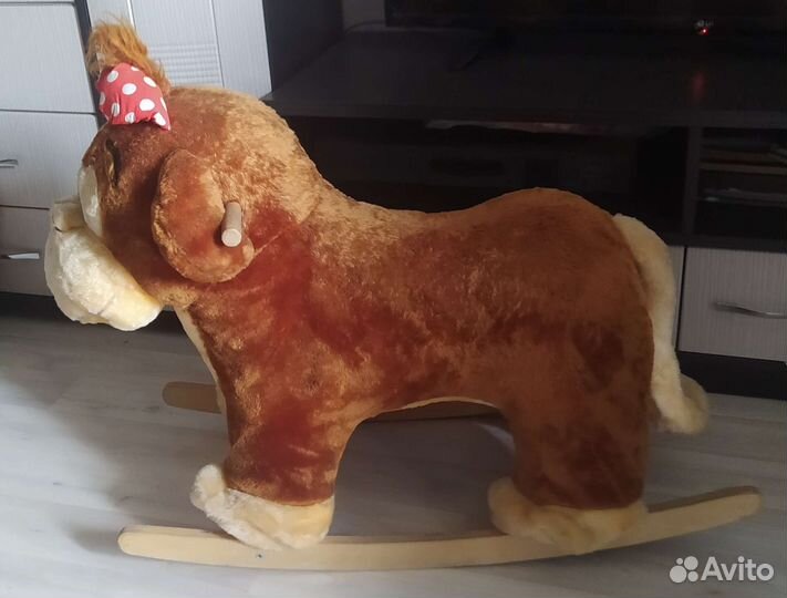 Детская игрушка качалка