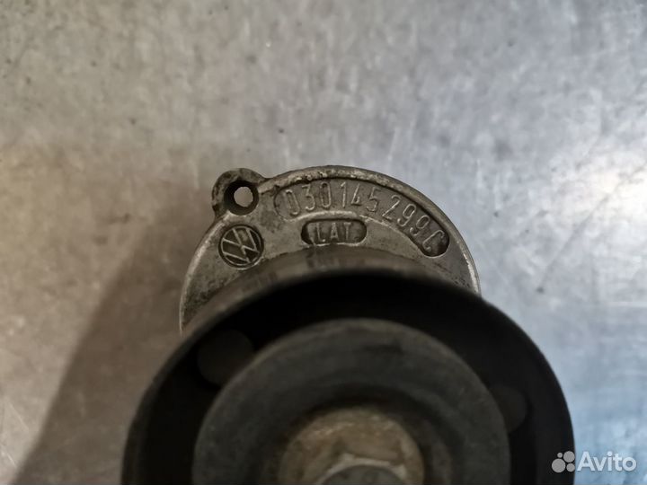 Натяжитель приводного ремня VAG 1,4 030145299C