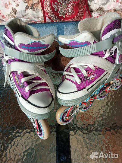 Роликовые коньки