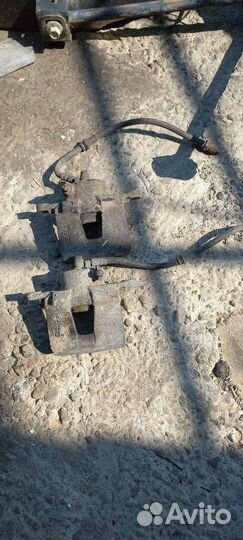 Суппорта передние на шевроле