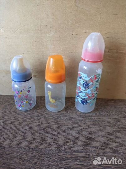 Молокоотсос medela ручной + 3 бутылочки + насадка