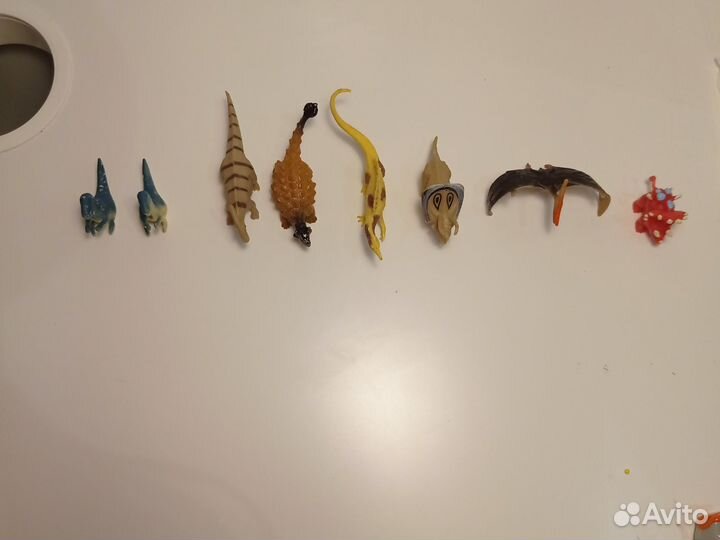 Динозавры игрушки