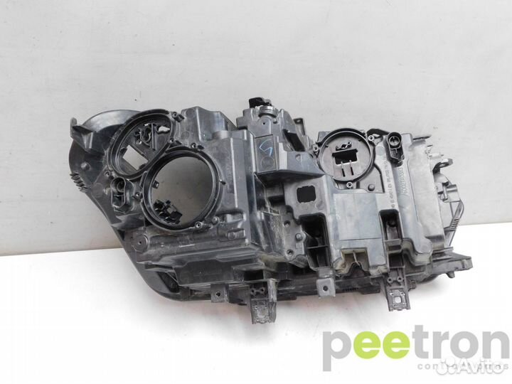 Б/У Б/У Корпус фары левой б/у Laser. 63119850425