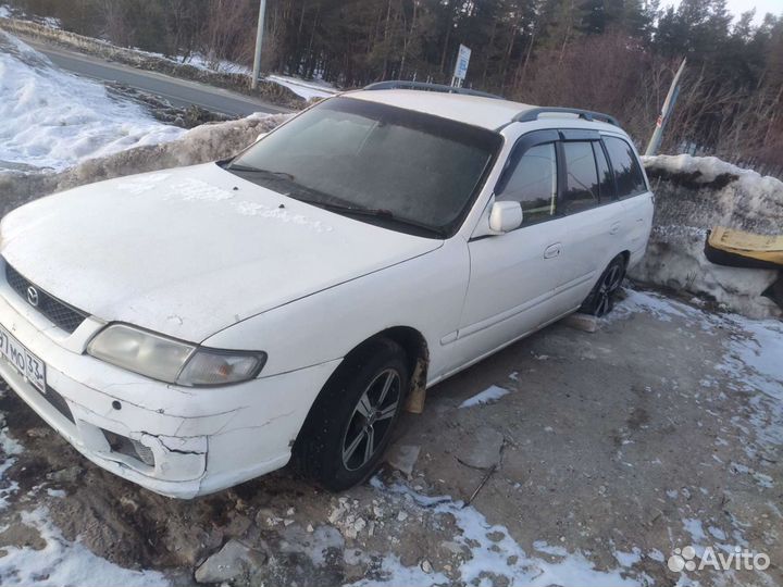 Дверь Мазда capella 1 8 1997г