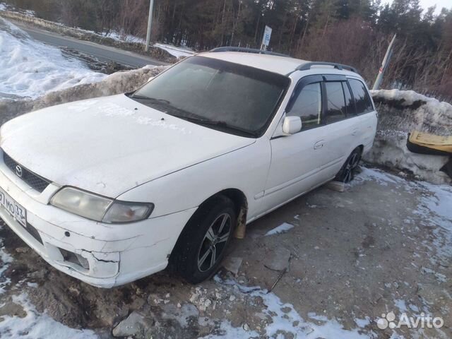 Дверь Мазда capella 1 8 1997г