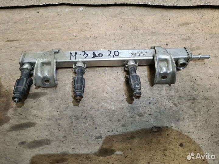 Топливная рампа форсунка Mazda Ford 2.0