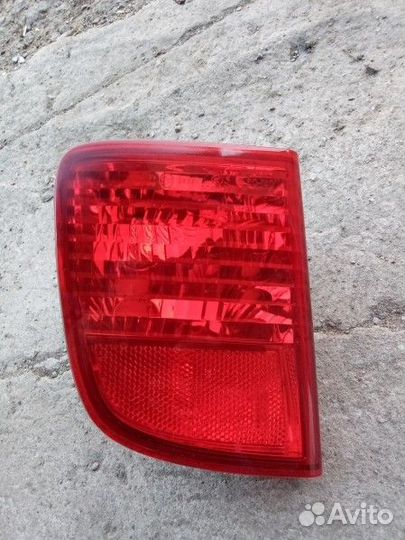 Фонарь задний в бампер левый Toyota Land Cruiser