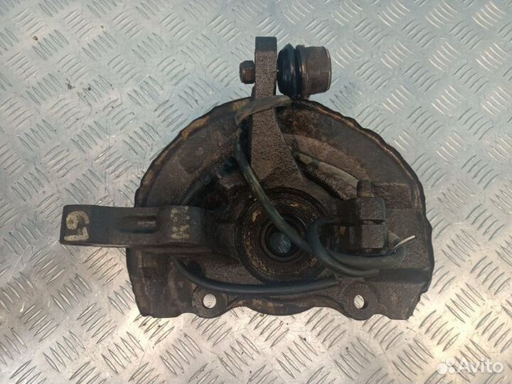 Кулак поворотный передний правый Mitsubishi Lancer