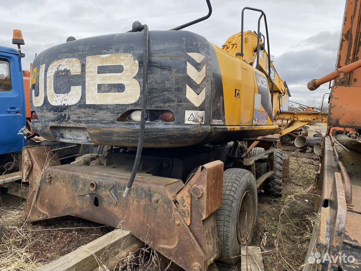 Колёсный экскаватор JCB JS 200W, 2012