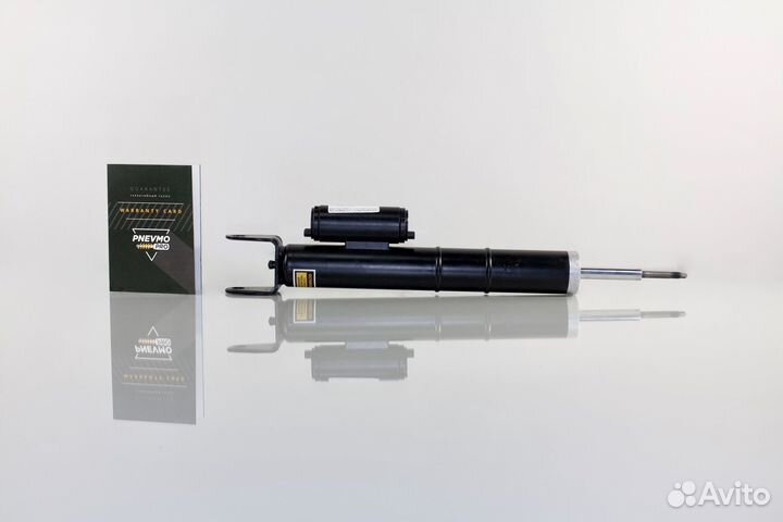 Амортизатор Мерседес 219 CLS 5.5 амг передний