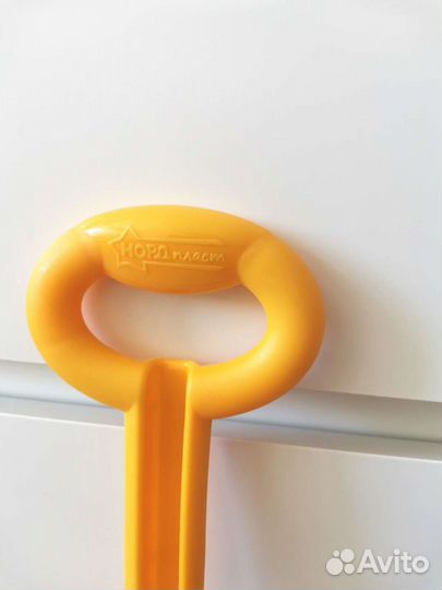 Игрушка каталка с ручкой