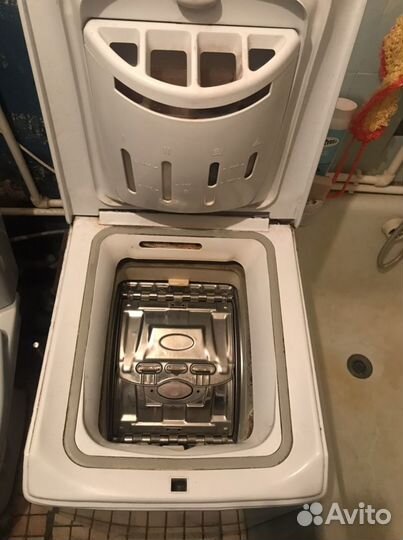 Стиральная машина с вертикальной загрузкой Indesit