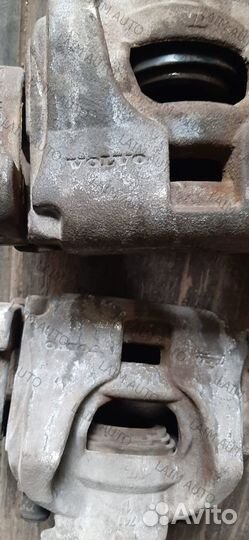 Суппорт тормозной передний Volvo XC70