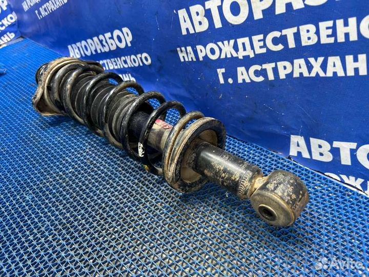 Задняя стойка амортизатора Mitsubishi Lancer 9