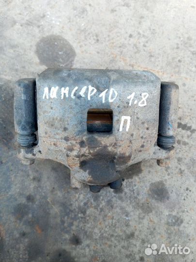 Скоба суппорта Mitsubishi lancer 10 переднего Прав