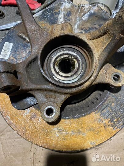 Кулак передний левый в сборе Kia Sportage 3