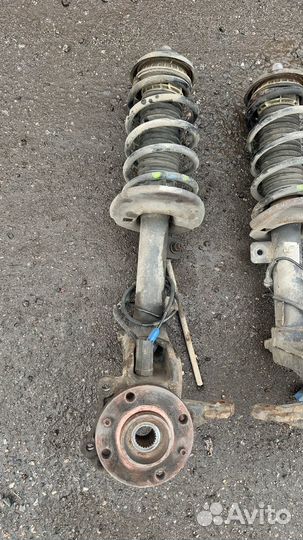 Амортизатор передний в сборе с кулаком Peugeot 207