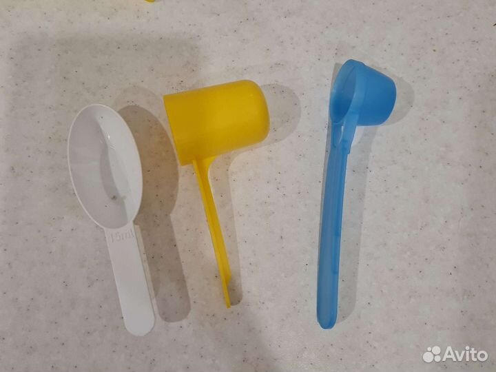 Новая пластиковая ложка мерная