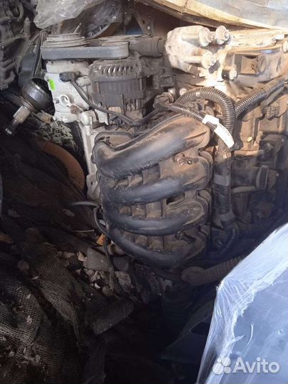 Коллектор Мазда 2.0