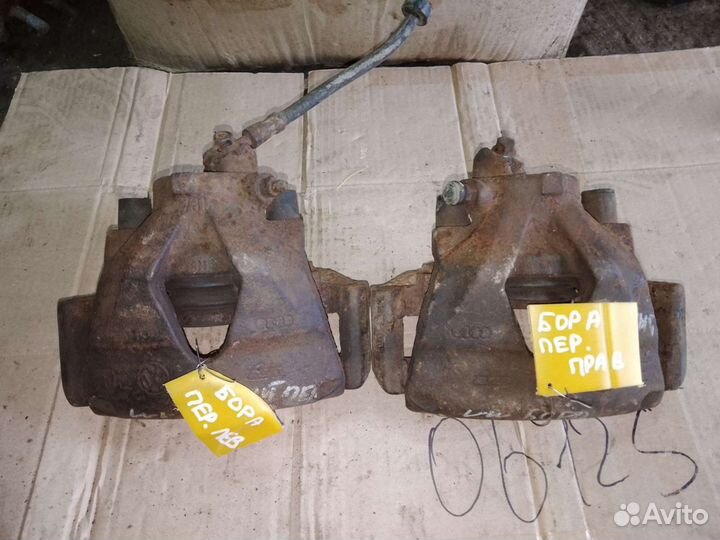 Супорт передний правый левый Volkswagen Bora