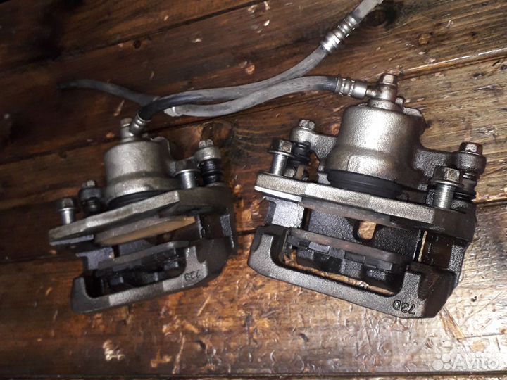 Суппорт задний Mazda CX-7