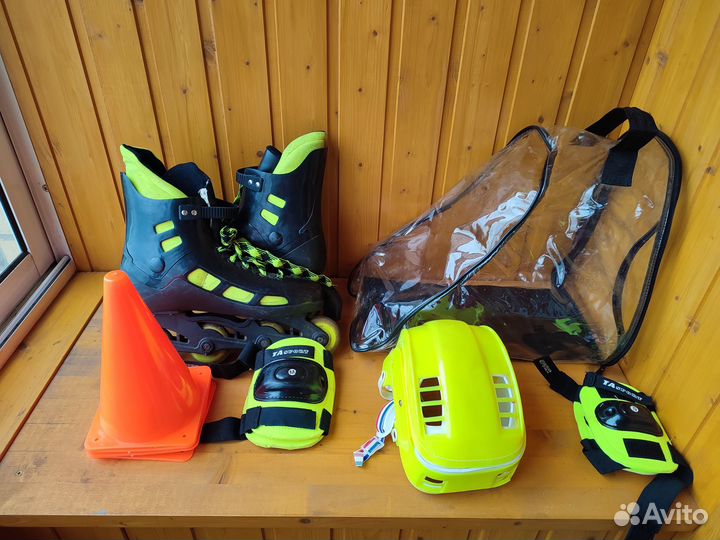 Роликовые коньки