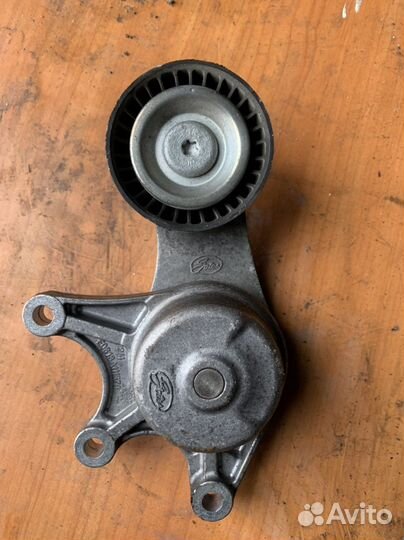 Натяжной ролик