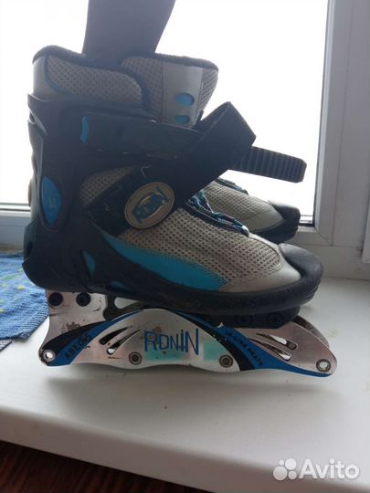 Роликовые коньки