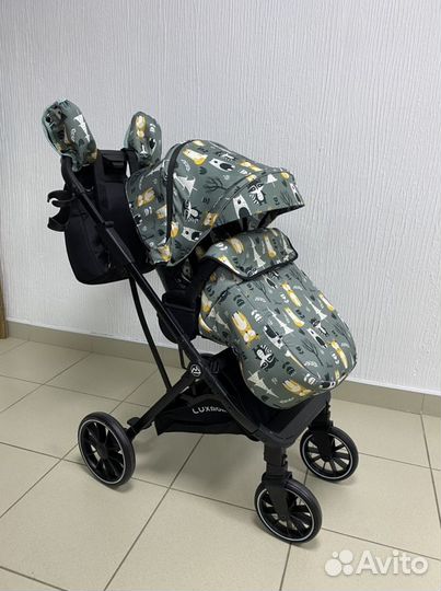 Коляска прогулочная с переставным сиденьем