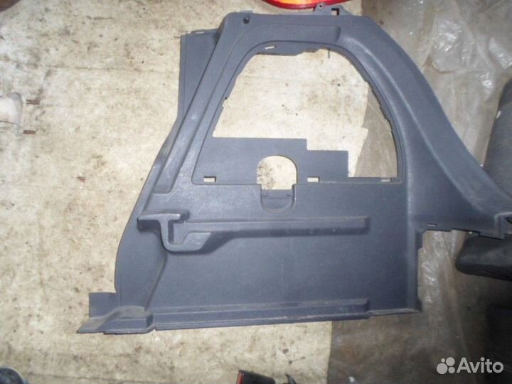 Обшивка багажника правая 3D Opel Corsa D 2006