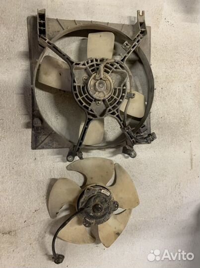 Вентилятор радиатора Митсубиси Лансер 7