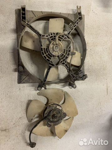 Вентилятор радиатора Митсубиси Лансер 7