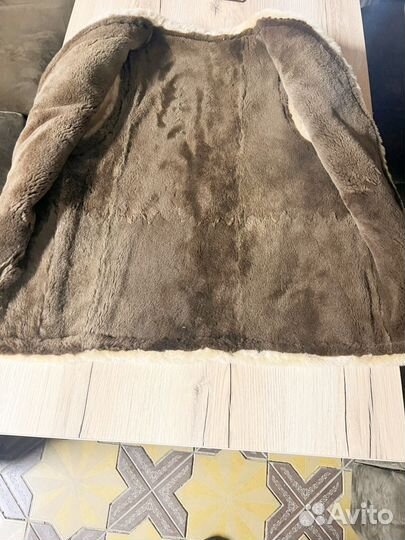 Меховая жилетка