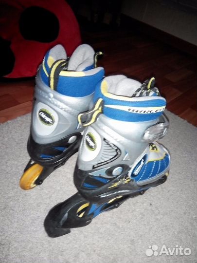 Роликовые коньки