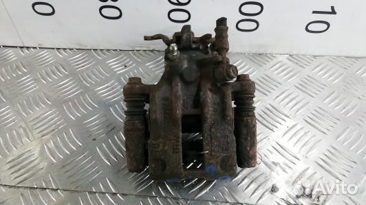 Суппорт тормозной задний левый nissan almera N16