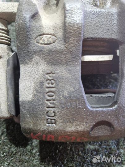 Суппорт тормозной передний Kia Rio хетчбек G4FC