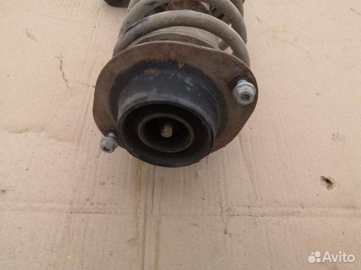 Амортизатор передний левый Daewoo Nexia N150 1.5