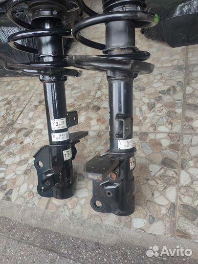 Стойка амортизатора Mazda сх 9 (2) 2018-2022г