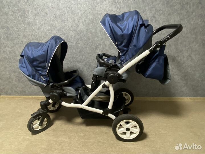 Двухместная коляска
