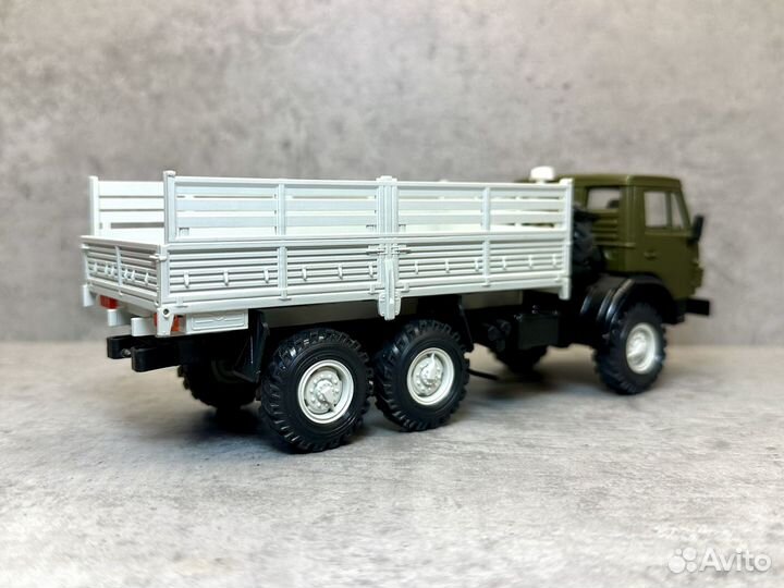 Модель грузовика камаз 4310 борт хаки 1:43